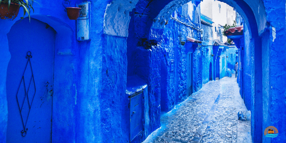http://Walking%20a%20blue%20alley%20in%20Chefchaouen%20on%20a%20Morocco%20Culture%20Tour