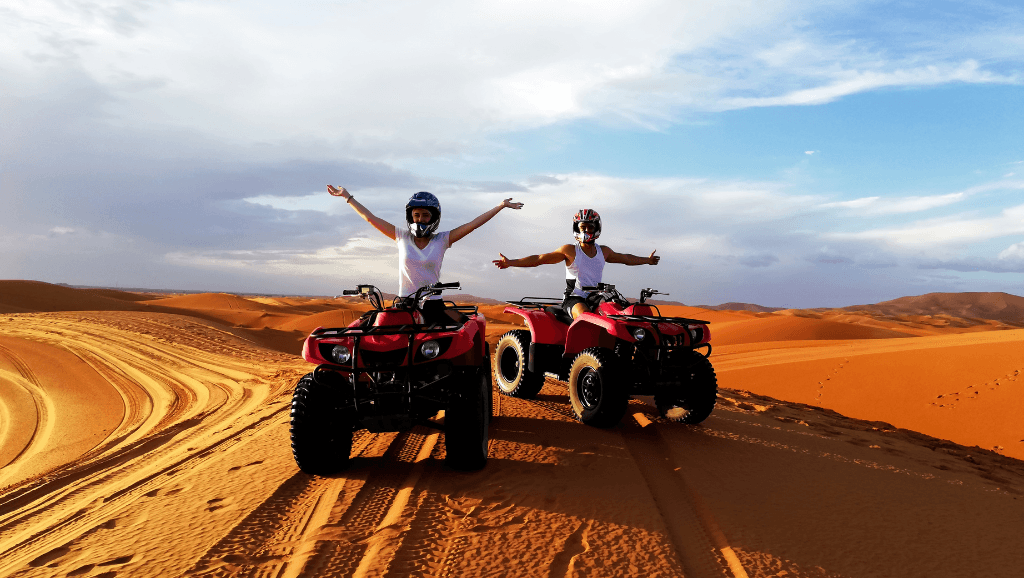 http://Tourists%20riding%20quads%20during%20a%205%20days%20Merzouga%20desert%20tour%20in%20Morocco