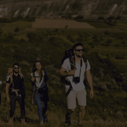 Happy traveler planning a trip with Morocco luxury travel agency