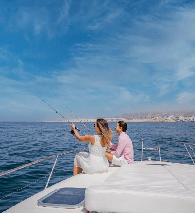 A couple laughing on a yacht during an Agadir boat trip in Morocco
