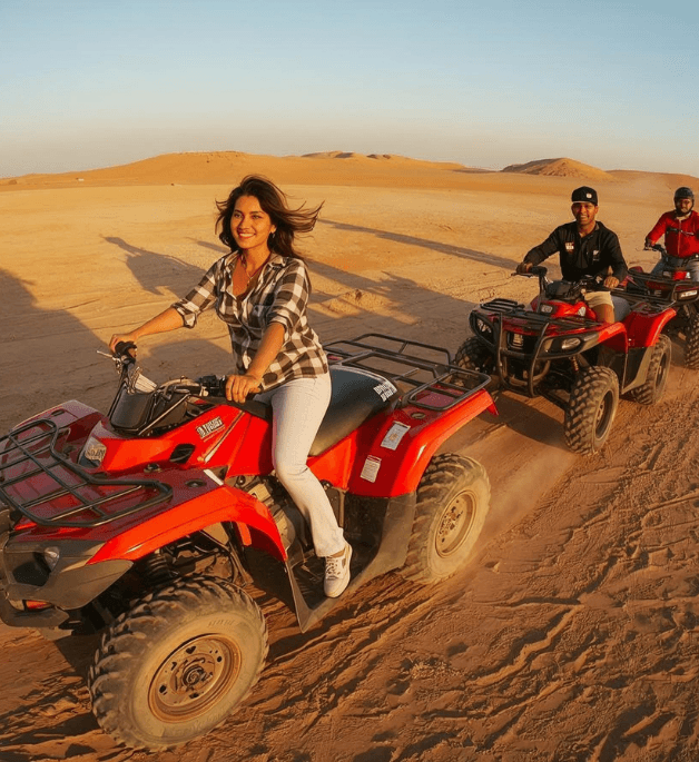 Smiling woman riding a red quad bike in Marrakech Palmeraie desert
